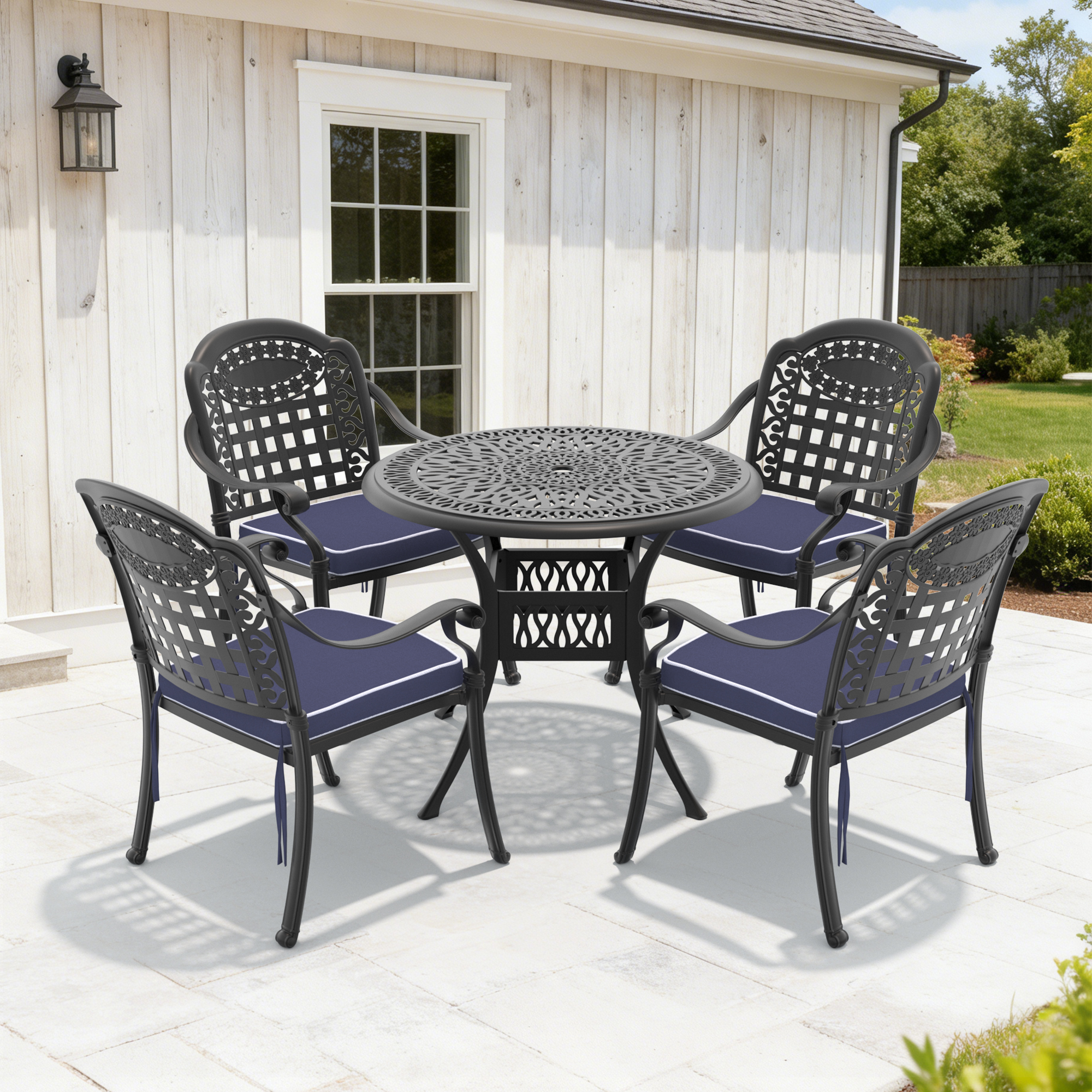 5-Piece Set Of Cast Aluminum Patio Furniture With Black Frame and Blue Seat Cushions