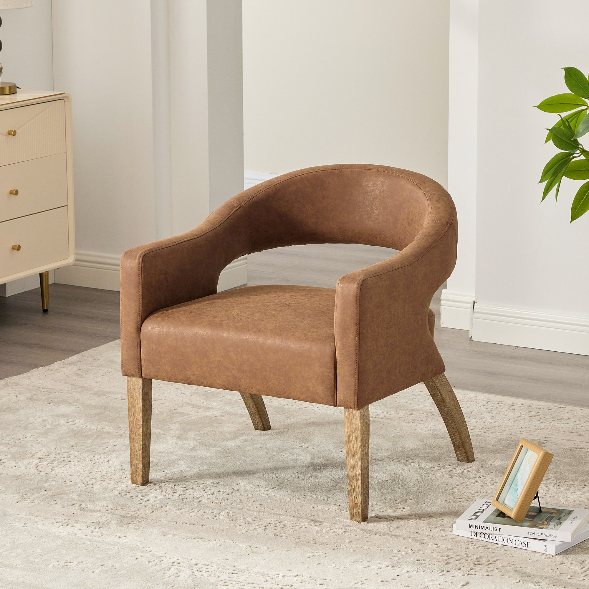 Modern Upholstered PU Open Back Accent Armchair Barrel Dining Chair with Weathered Rubberwood Legs, Hollow-Out Side Club Chair for Living Room Bedroom Restaurant Cafes Dining Room Reception,Brown